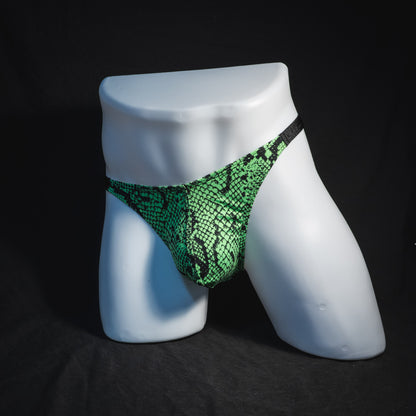 Men's neon green snakeskin thong underwear, classic cut, full angled front view.