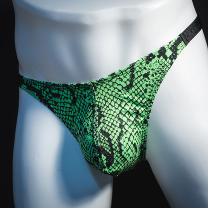 Men's neon green snakeskin thong underwear, classic cut, angled front view.