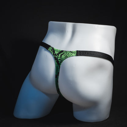 Men's neon green snakeskin thong underwear, classic cut, full angled rear view.