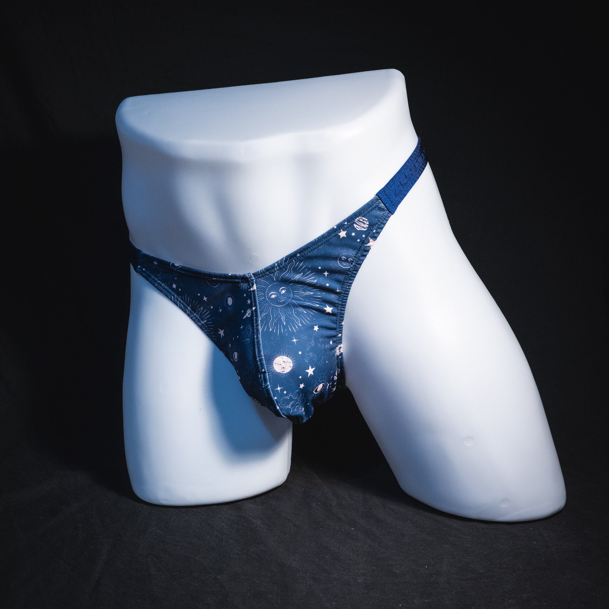 Men's blue suns and moons thong underwear, classic cut, Full front angled view