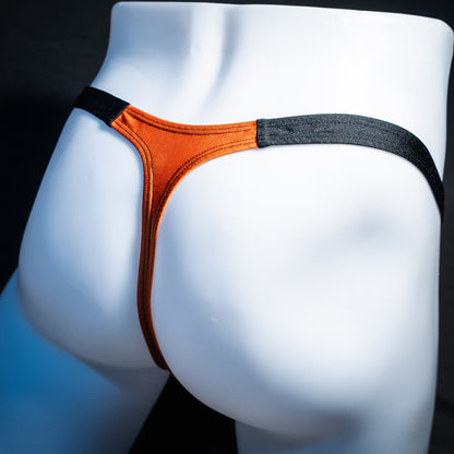 Men's orange and black Halloween thong underwear, classic cut, rear view.