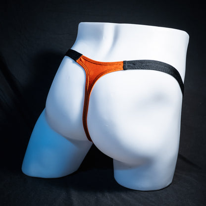 Men's orange and black Halloween thong underwear, classic cut, rear view.
