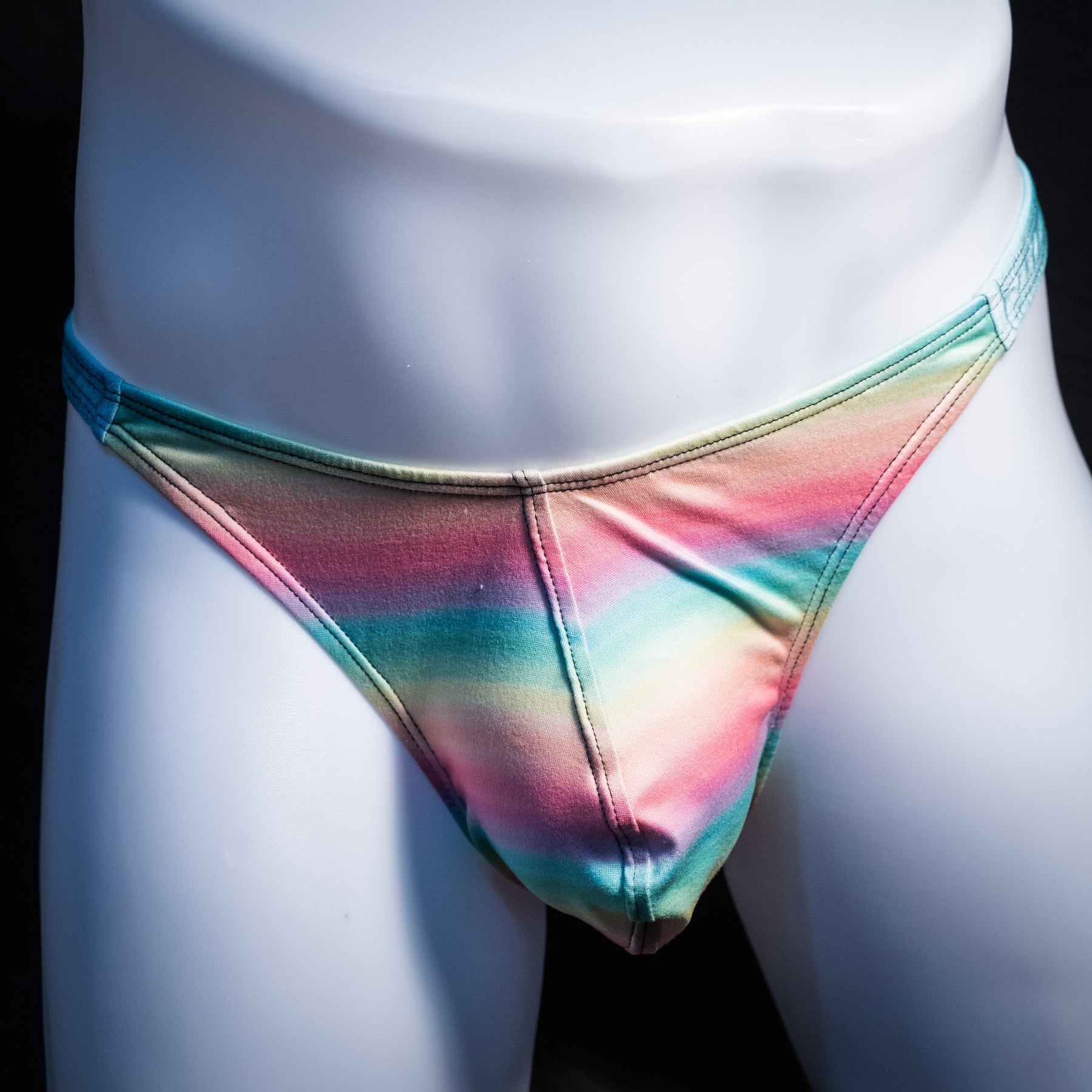Men's pastel rainbow striped thong underwear, classic cut, Front view