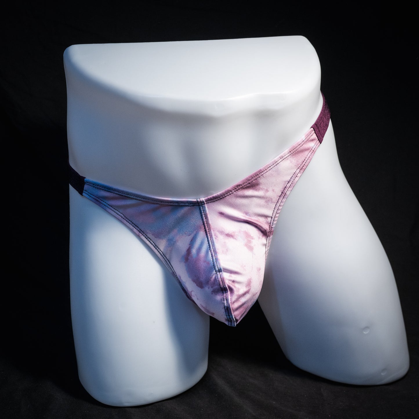 Men's pink cotton candy thong underwear, classic cut, front view.