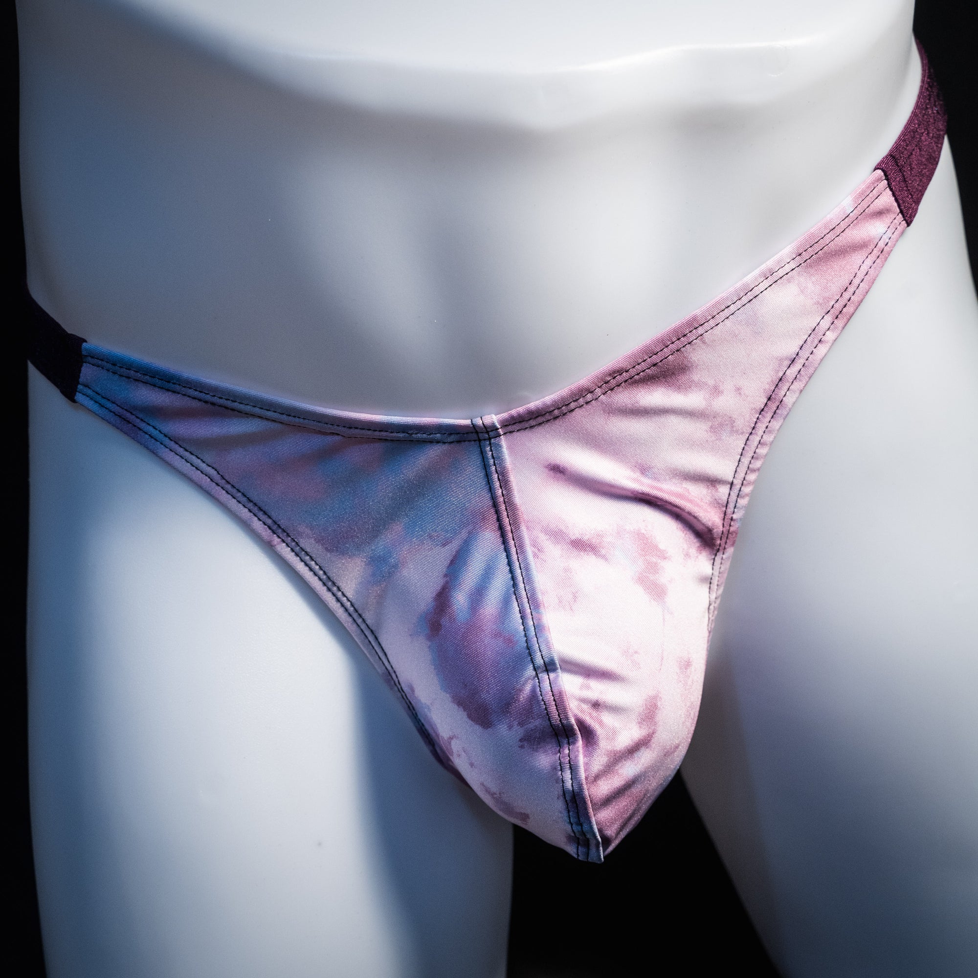 Men's pink cotton candy thong underwear, classic cut, front view.
