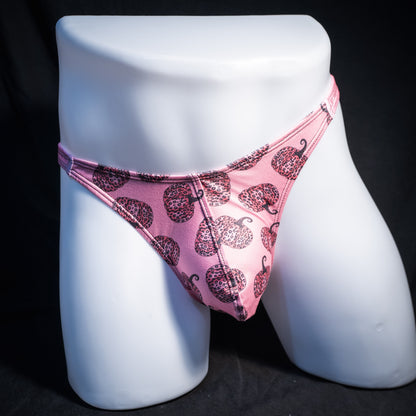 Men's pink pumpkins autumn thong underwear, classic cut, front view.