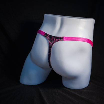 Men's pink metallic snakeskin thong underwear, classic cut, rear view.
