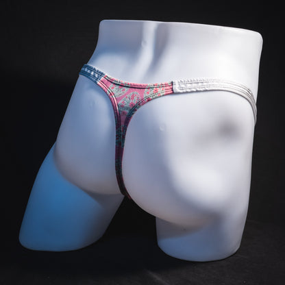 Men's pink painted easter eggs thong underwear, classic cut, full angled rear view.
