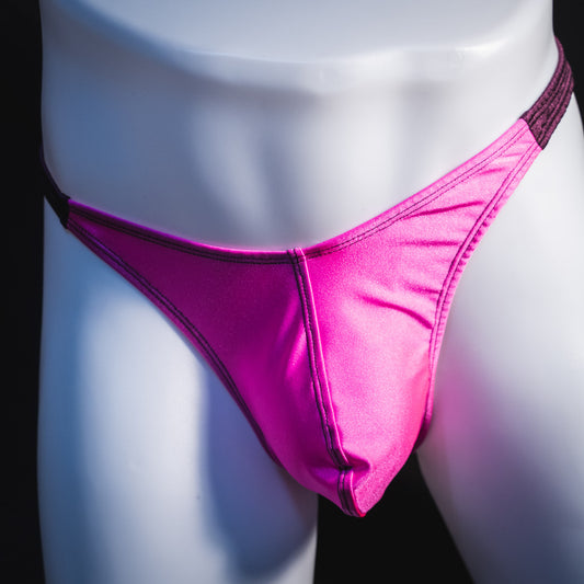 Men's pink and purple thong underwear, classic cut, front view.