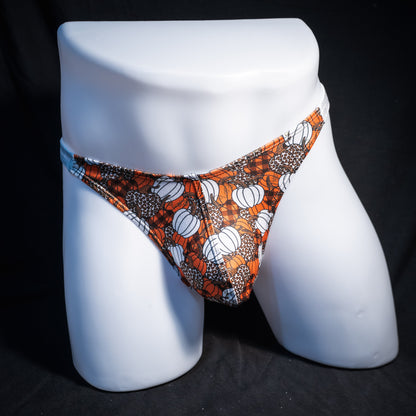 Men's pumpkin themed thong underwear, classic cut, front view.
