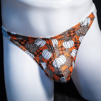 Men's pumpkin themed thong underwear, classic cut, front view.