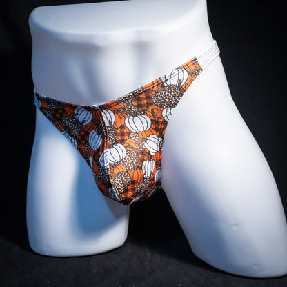 Men's pumpkin themed thong underwear, classic cut, front view.