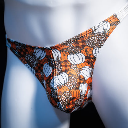 Men's pumpkin themed thong underwear, classic cut, front view.