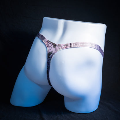 Men's purple ghosts and bats Halloween themed thong underwear, classic cut, rear view.