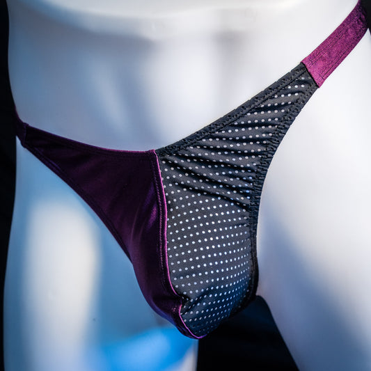 Men's half mesh and purple thong underwear, classic cut, front angled view.