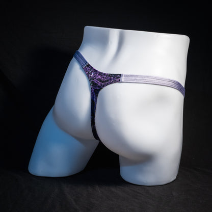 Men's purple metallic snakeskin thong underwear, classic cut, rear view.
