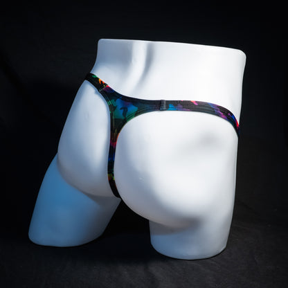Men's rainbow camo thong underwear, classic cut, rear view.