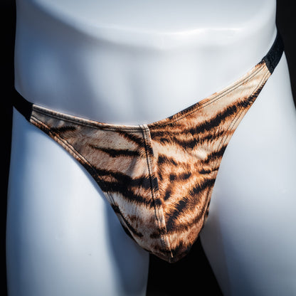 Men's tiger stripe thong underwear, classic cut, front view.