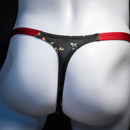 Men's red and black floral thong underwear, classic cut, rear view.