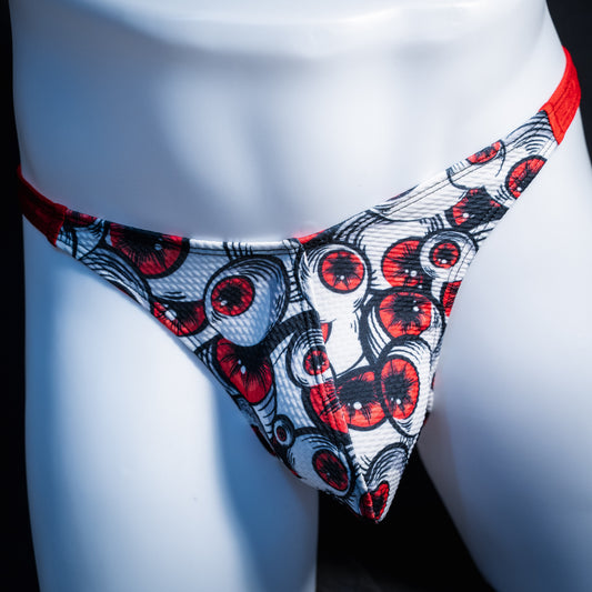 Men's red eyeball thong underwear, classic cut, front view.