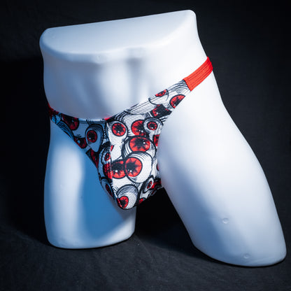 Men's red eyeball thong underwear, classic cut, front view.