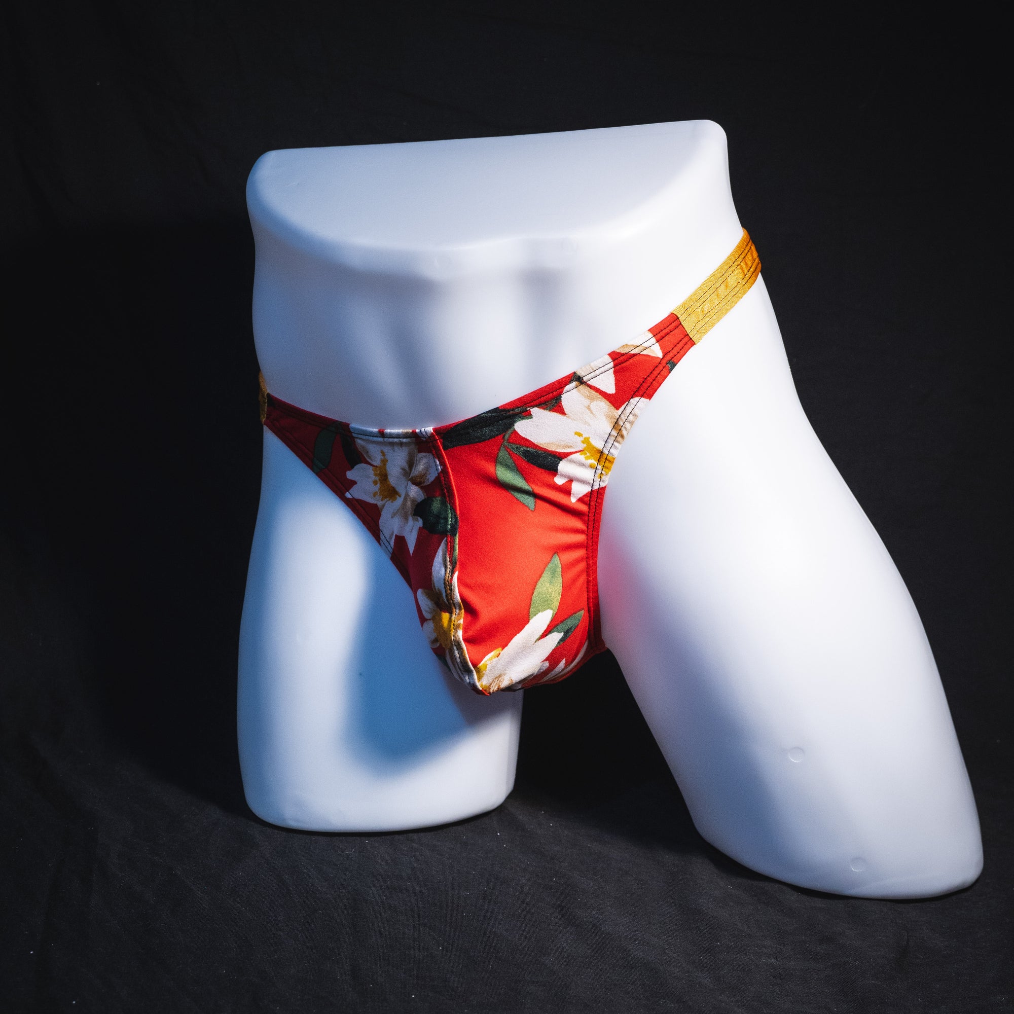 Men's red floral with gold straps thong underwear, classic cut, Full angled front view