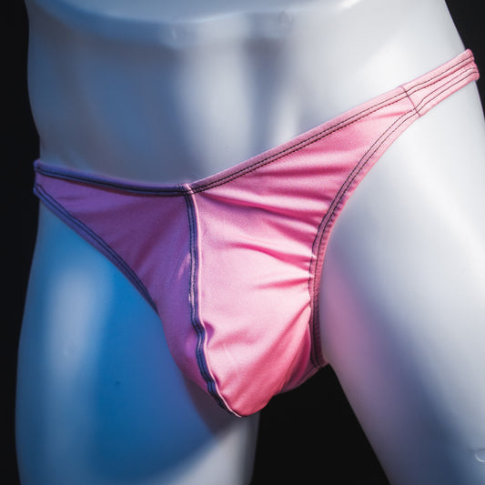 Men's rose pink thong underwear, classic cut, angled front view.