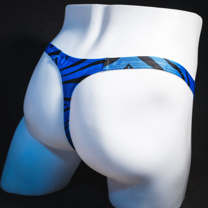 Men's shiny blue zebra stripe thong underwear, classic cut,  angled rear view.