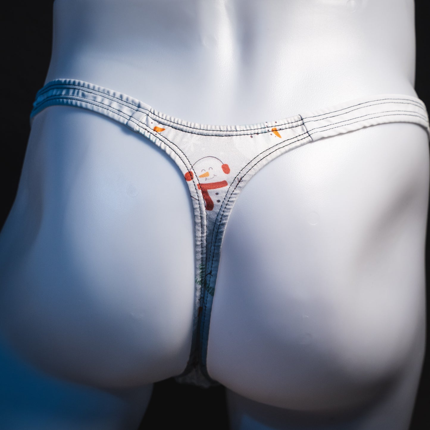 Men's snowmen thong underwear, classic cut, rear view.