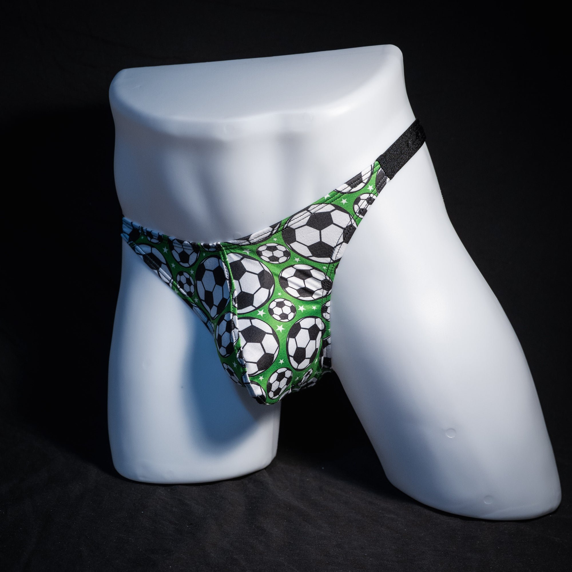 Men's soccer themed thong underwear, classic cut, front view.