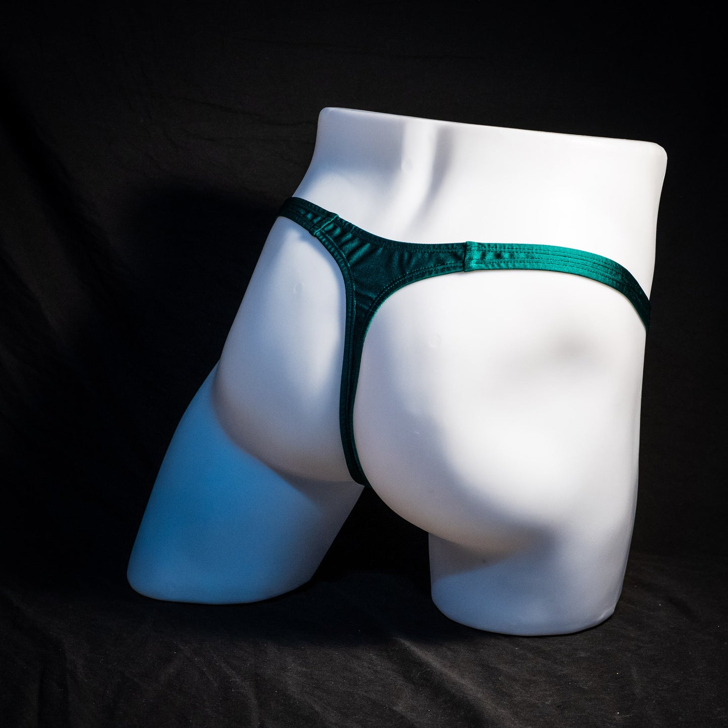 Men's forest green thong underwear, classic cut, Full angled rear view