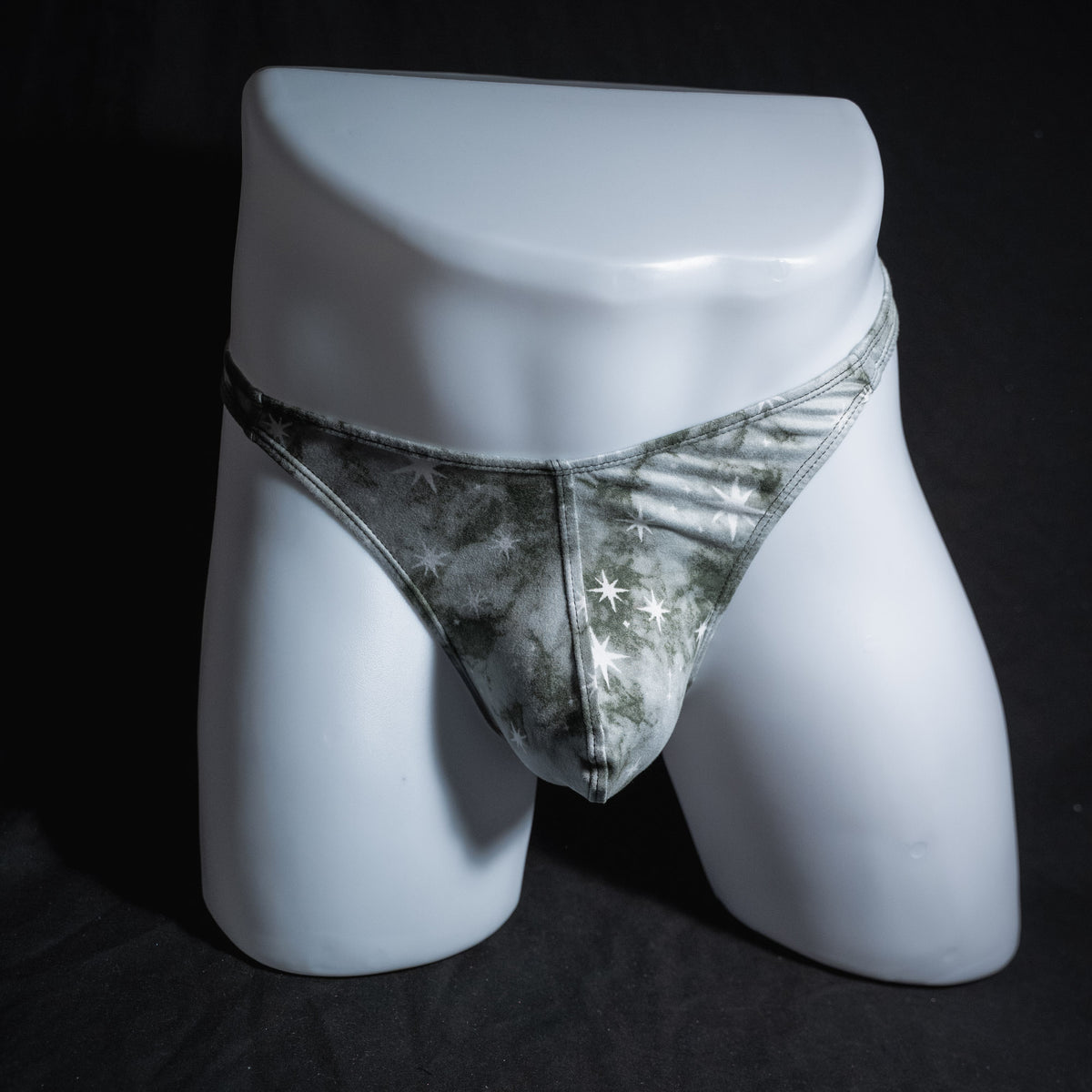 Men's grey tie dye with stars thong underwear, classic cut, full front view.