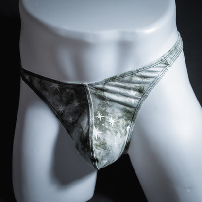 Men's grey tie dye with stars thong underwear, classic cut, front angled view.
