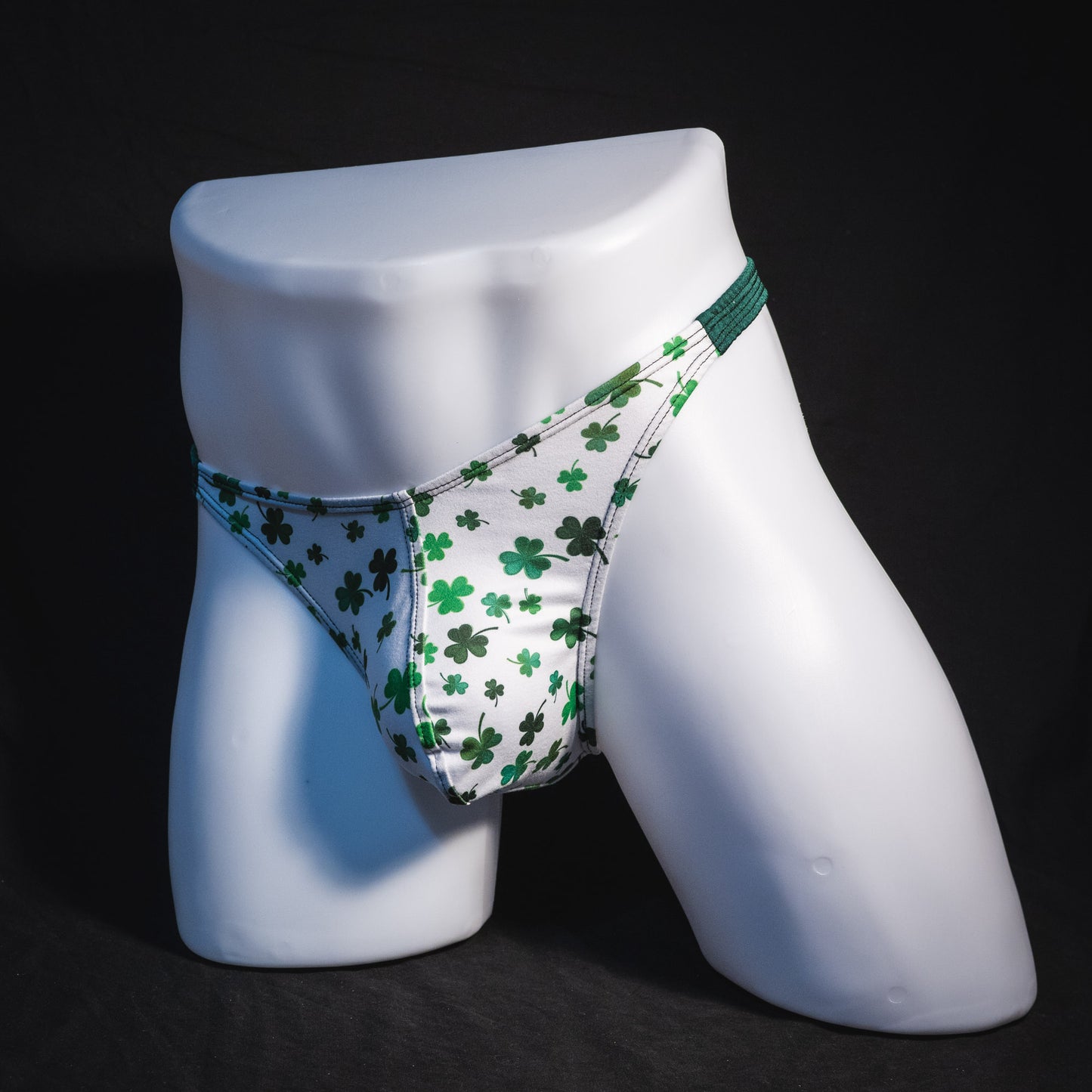 Men's shamrock thong underwear, classic cut, full angled front view.