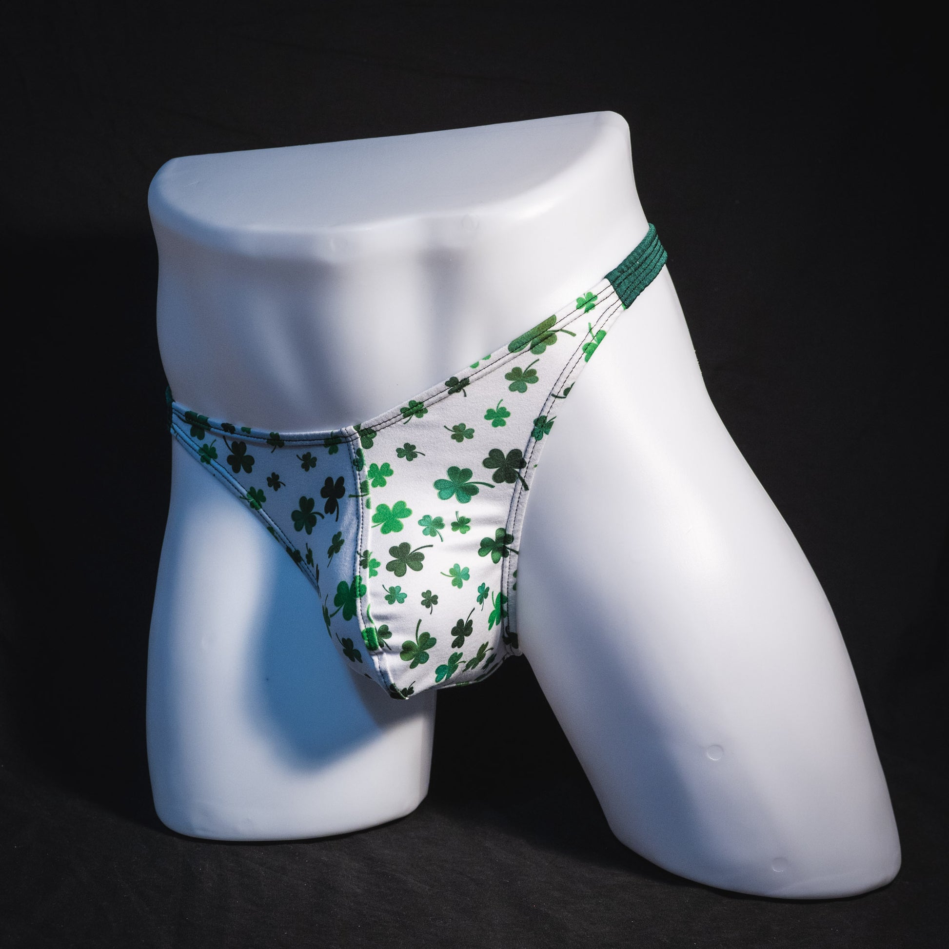 Men's shamrock thong underwear, classic cut, full angled front view.