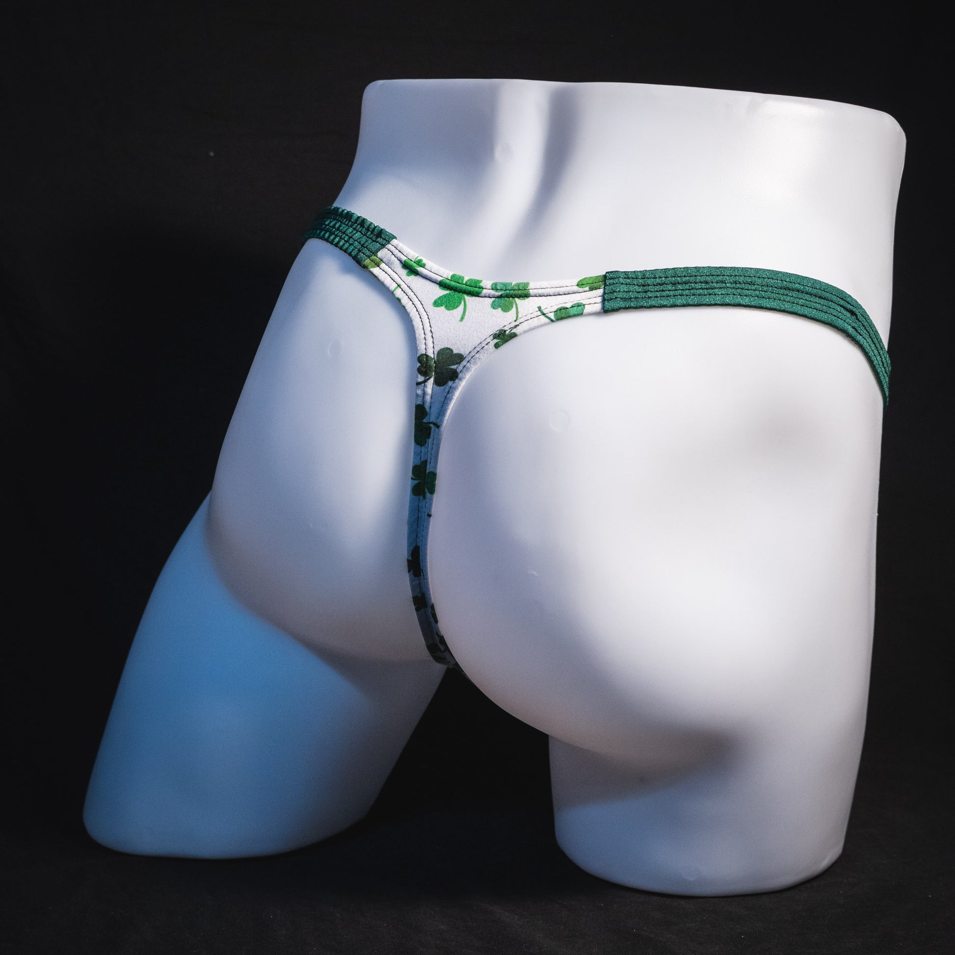 Men's shamrock thong underwear, classic cut, full angled rear view. 