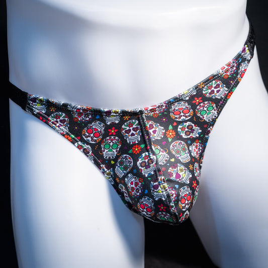 Men's sugar skull patterned thong underwear, classic cut, front view.