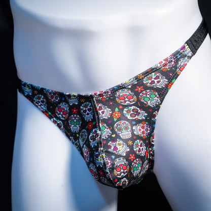 Men's sugar skull patterned thong underwear, classic cut, front view.