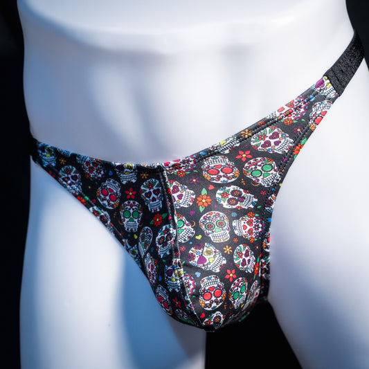Men's sugar skull patterned thong underwear, classic cut, front view.