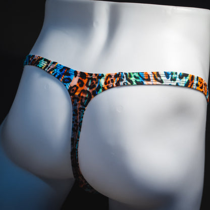 Men's colorful cheetah thong underwear, classic cut, rear angled view.