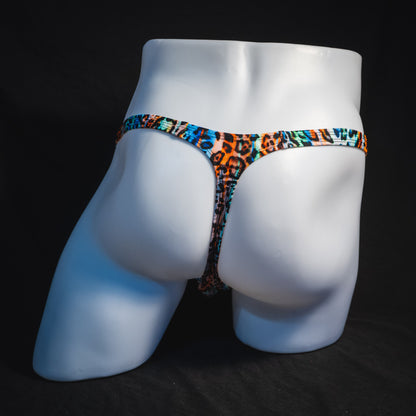 Men's colorful cheetah thong underwear, classic cut, full angled rear view.