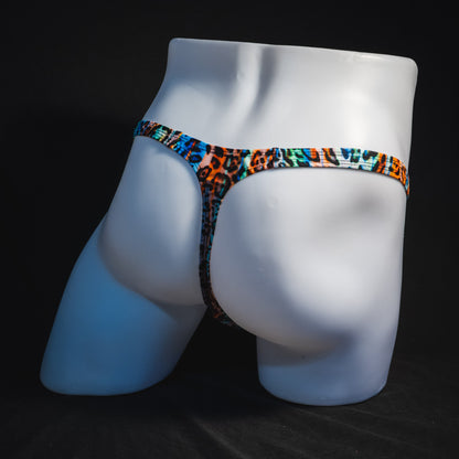 Men's colorful cheetah thong underwear, classic cut, full angled rear view.