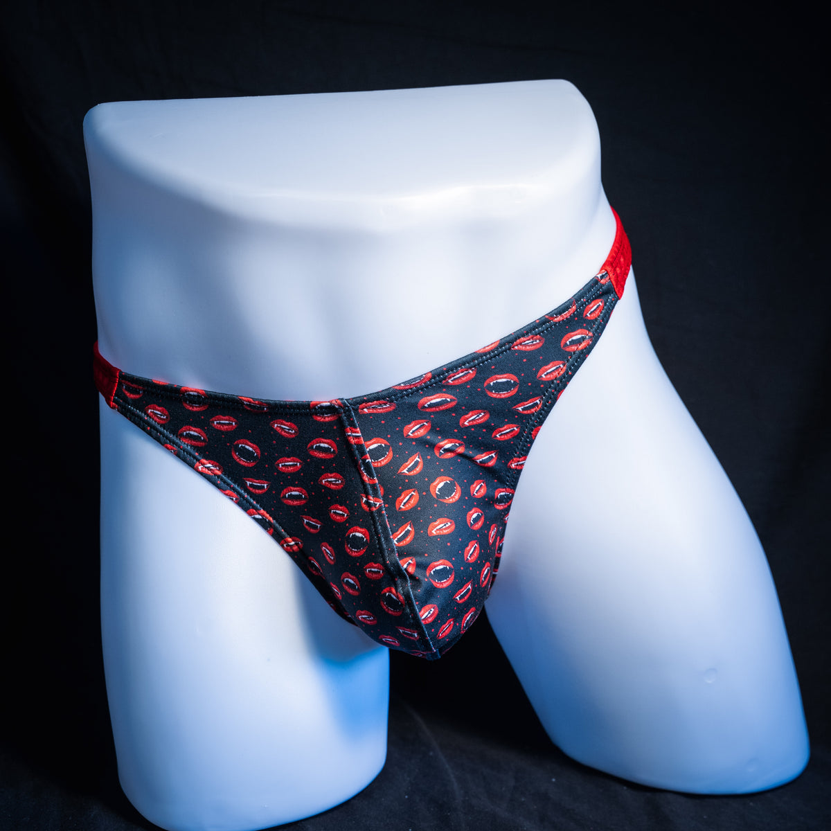 Men's Vampire mouths thong underwear, classic cut, front view.