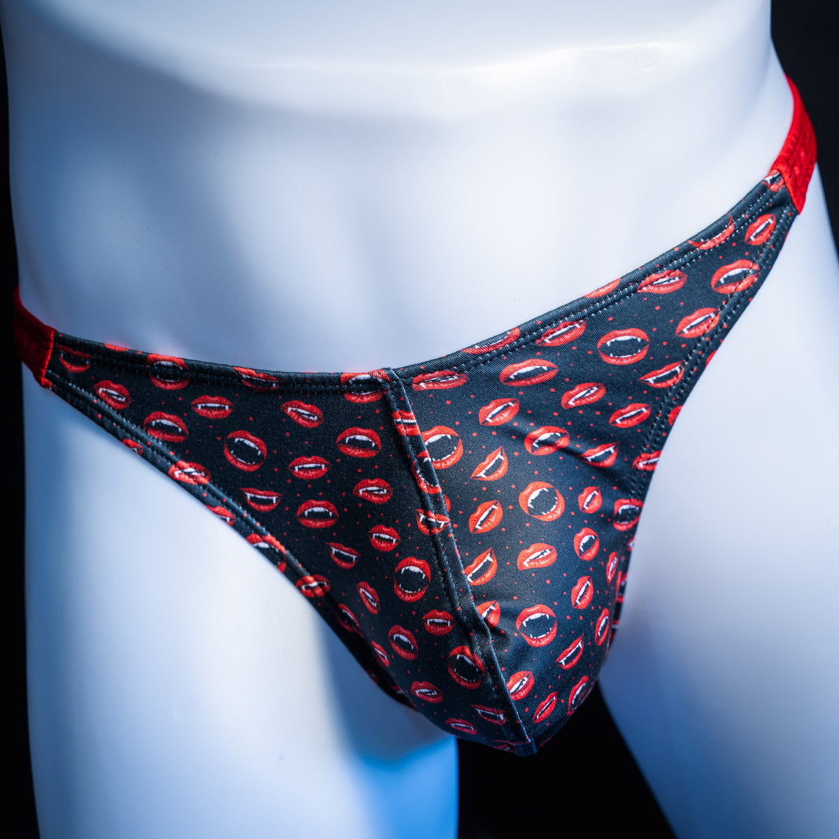 Men's Vampire mouths thong underwear, classic cut, front view.