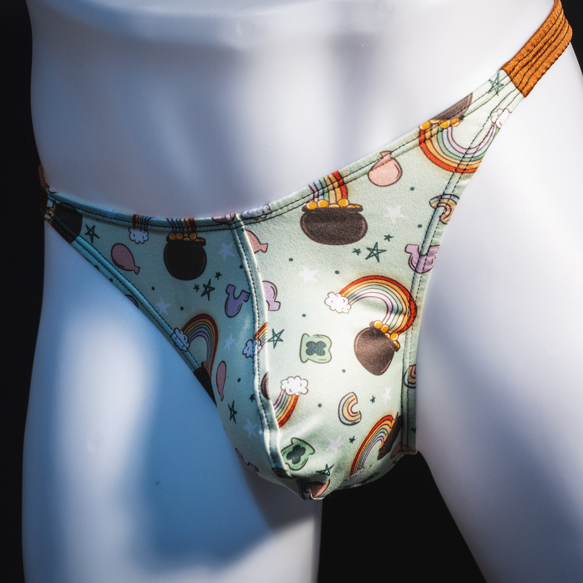 Men's vintage st patricks day thong underwear, classic cut, angled front view.
