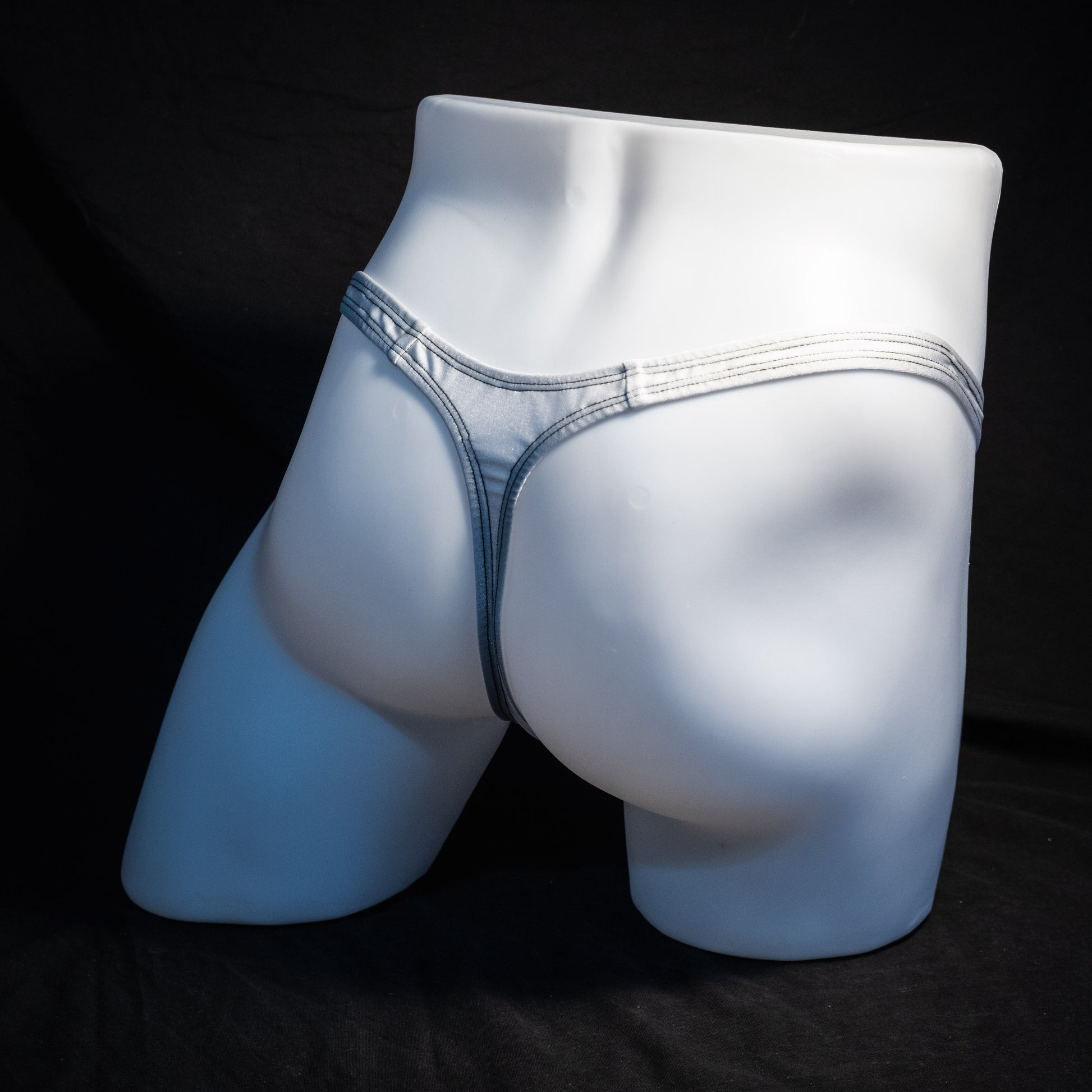Men's white and mesh thong underwear, classic cut, Full rear angled view