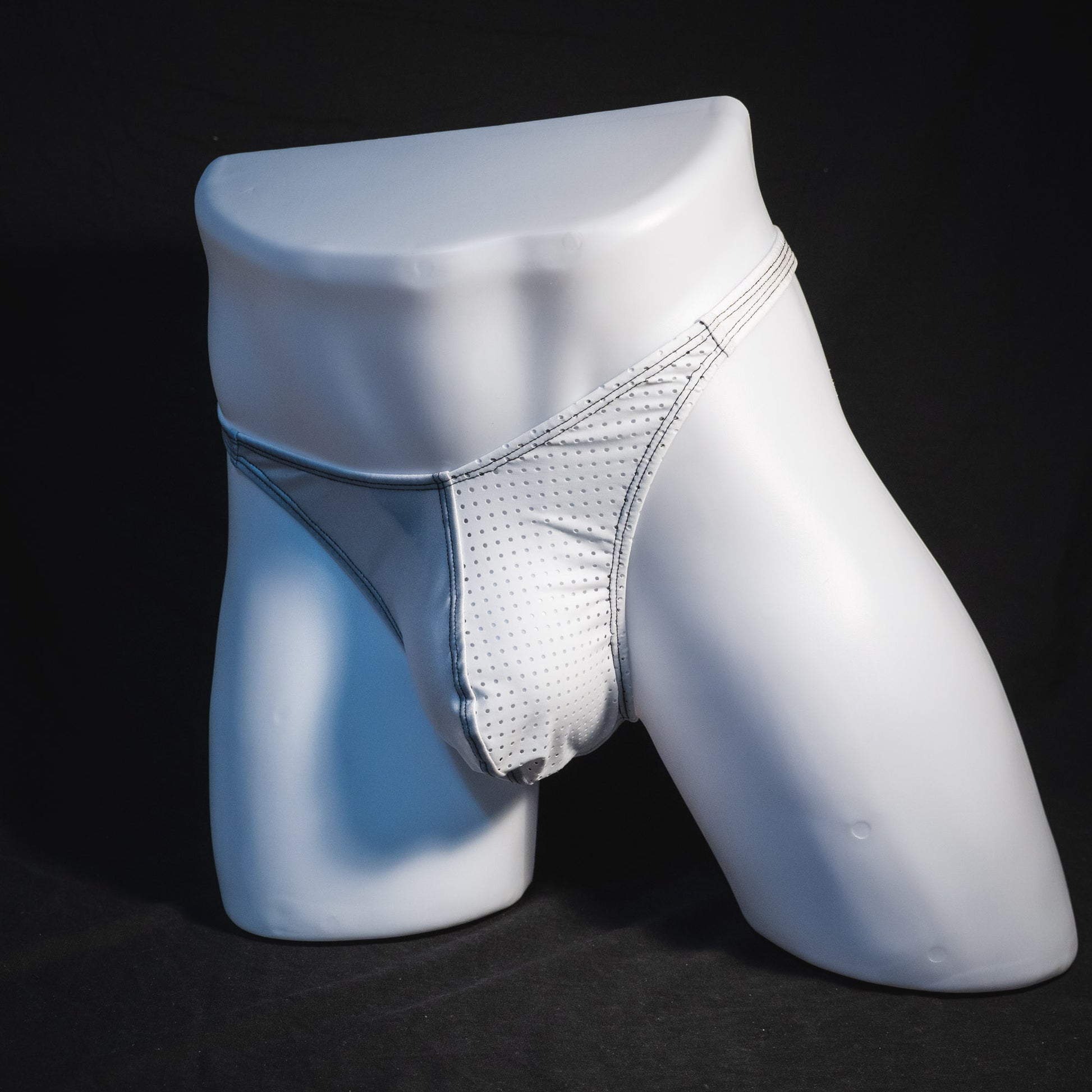 Men's white mesh thong underwear, classic cut, full angled front view.