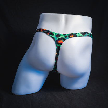 Men's wild green cheetah thong underwear, tower cut, full rear view.
