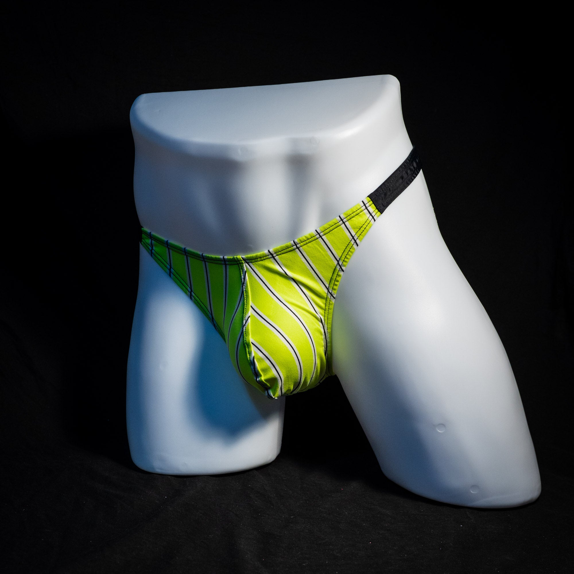Men's yellow striped thong underwear, classic cut, full front angled view.