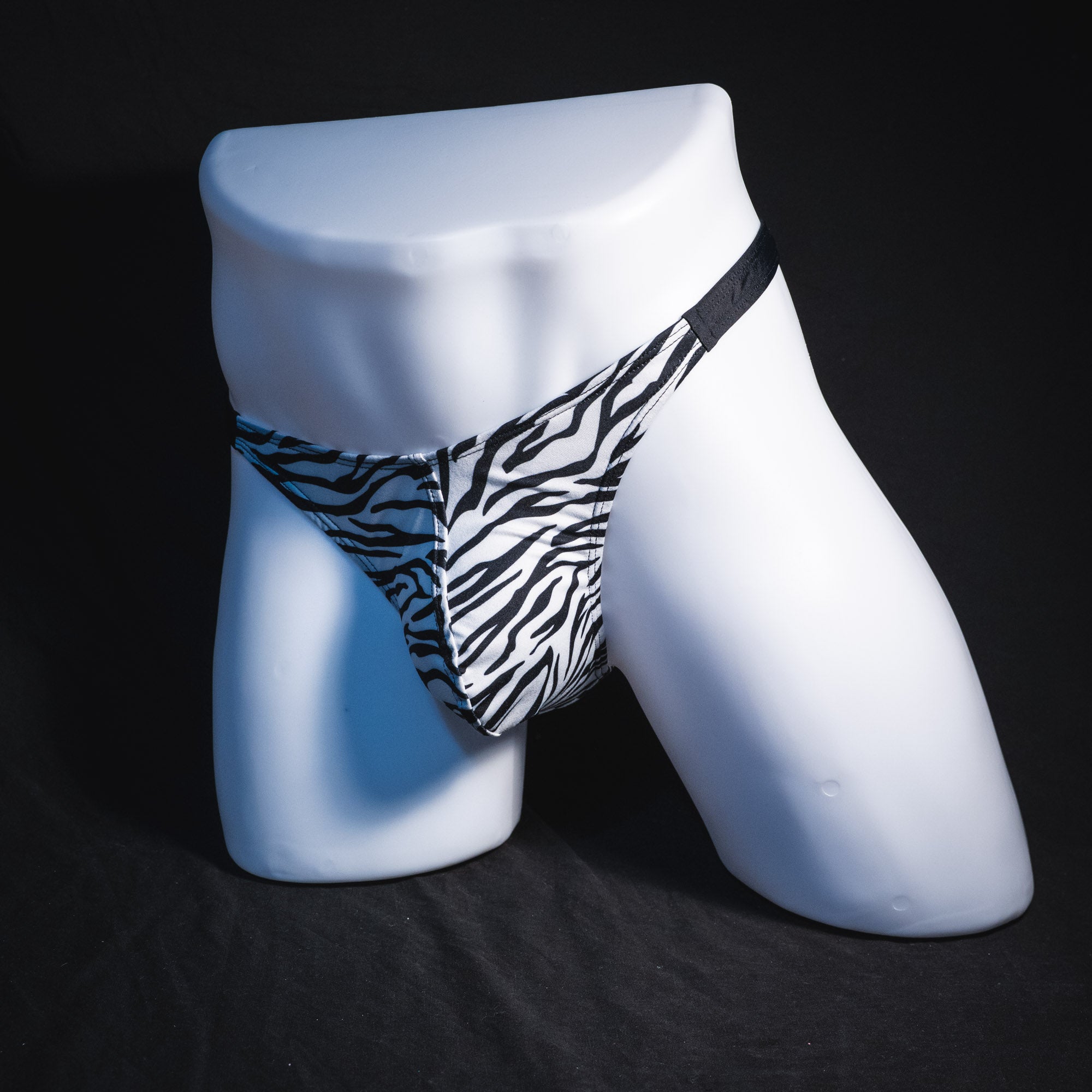 Men's zebra print thong underwear, classic cut, Full front angled view